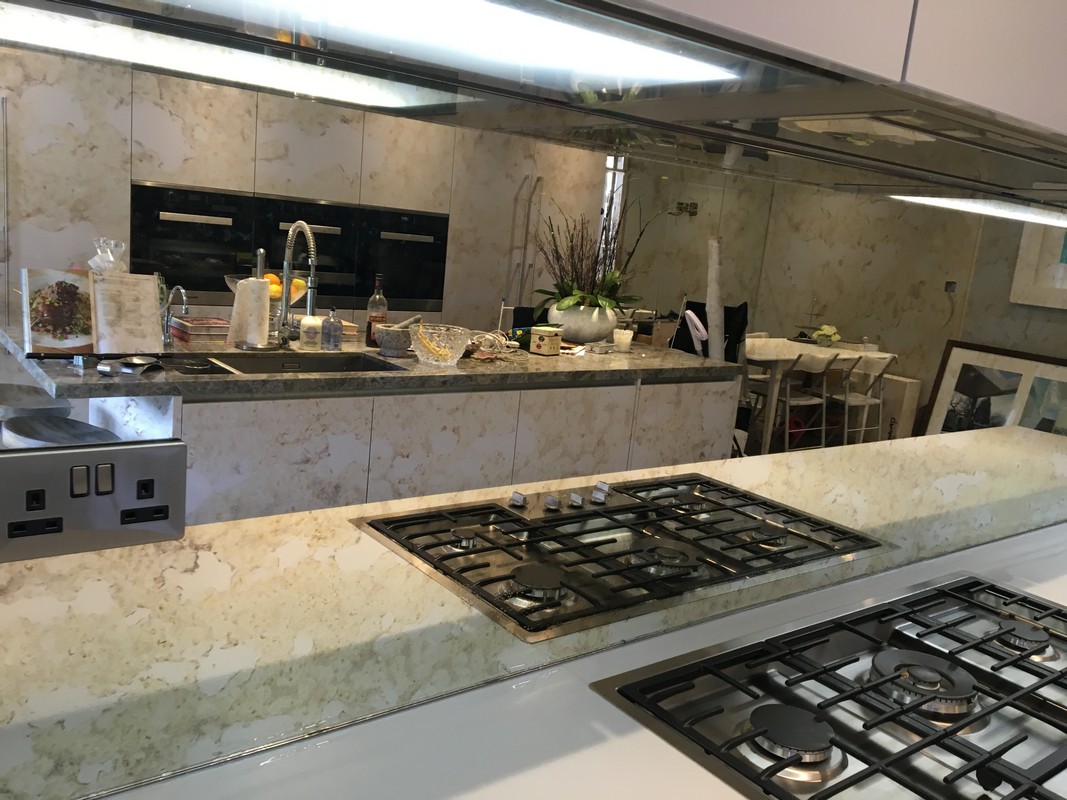 Mirror glass splashback in Peckham luxury kitchen